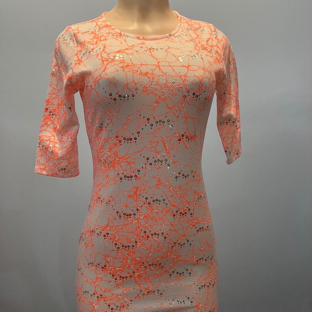 This is a mini pink party dress